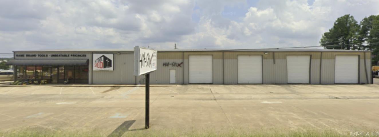 Exceptional opportunity to own a versatile commercial property with high visibility and easy access on Highway 5 in Benton. This spacious metal building features over 17,750 square feet of flexible space, which is ideal for warehousing, retail, light industrial, or distribution. It includes multiple oversized roll-up doors for efficient loading/unloading, a showroom or office area in front with glass entry, and ample paved parking.