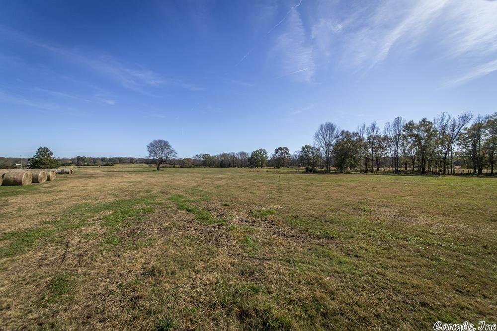 Fabulous farm on 163 +/- acres, Open Fields with 3 buildings, hay barn all metal 56' x 140', Arena 120' x 150', Shop w/3 overhead doors 30' x 65' and three ponds.