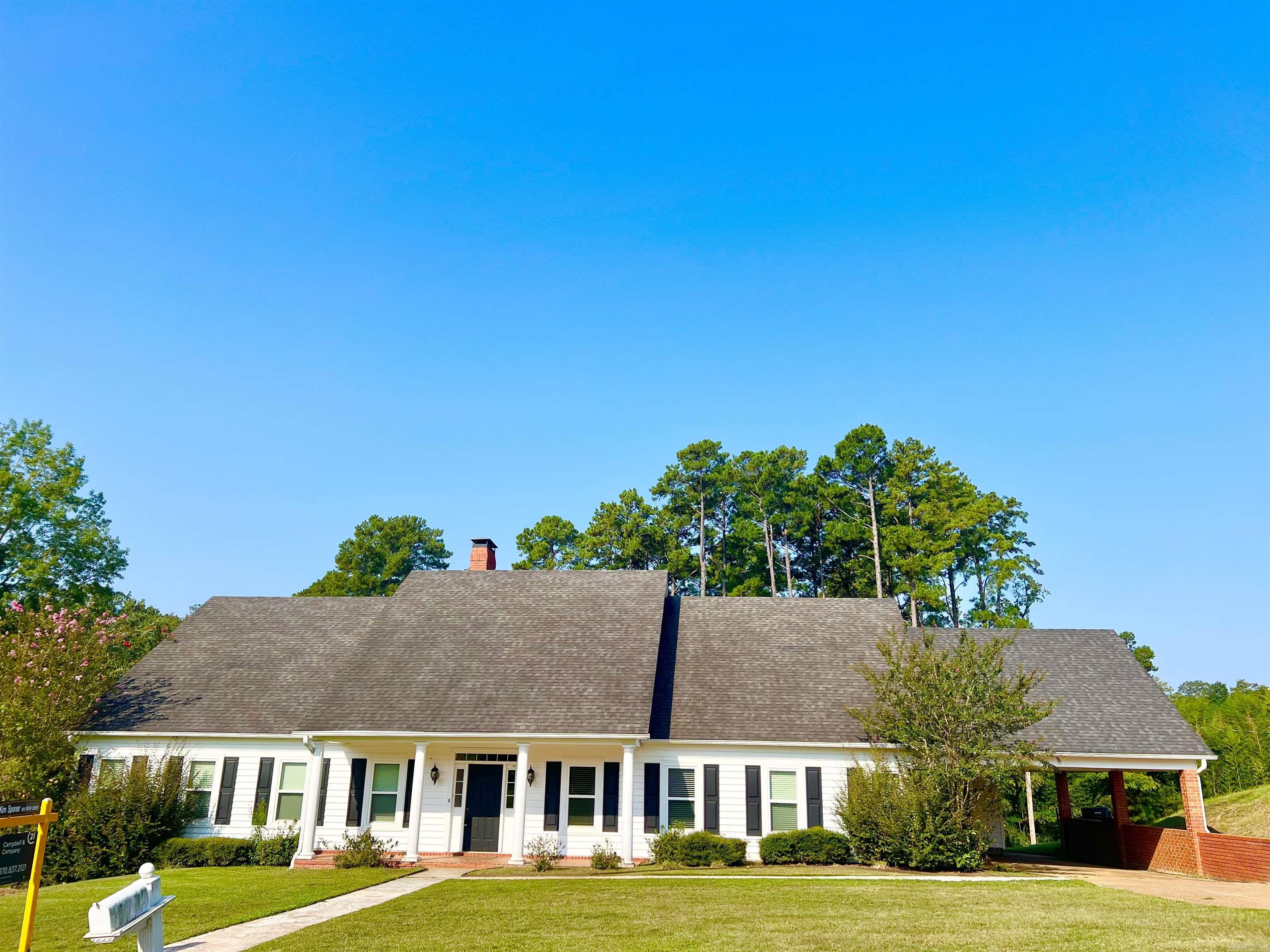 Step into comfort & style w/ this beautifully maintained 3BR, 2BA traditional 2-story home. From the inviting front porch to the spacious covered patio, this home is designed for both relaxed living & effortless entertaining. Inside, you’ll find vaulted ceilings, hardwood floors, & two generous living areas—including a cozy den w/ a gas log fireplace. The separate dining room features elegant built-in cabinetry, perfect for gatherings/everyday meals. The heart of the home is the custom-built gourmet kitchen, complete w/ a large kitchen island, granite countertops, a full side-by-side refrigerator/freezer, & a high-end range—ideal for home chefs & entertaining. All three bedrooms are conveniently located on the main level, including a spacious primary suite with an ensuite bathroom & 2 walk-in closets. Upstairs, a large bonus room provides endless flexibility for an office, playroom, media space, or guest suite. Enjoy outdoor living on the covered patio overlooking the backyard—great for barbecues, morning coffee, or quiet evenings. Additional features include an attached double garage w/ a dedicated storage room, providing plenty of space for tools, equipment, or seasonal items.