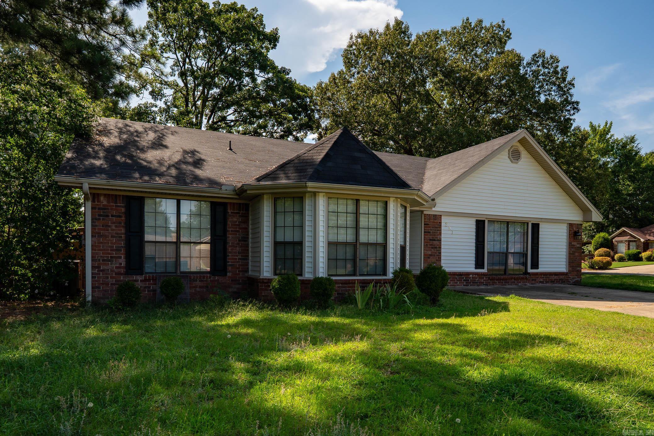Welcome to 297 Southwick Drive in Conway, Arkansas a well maintained 3 bedroom, 2 bathroom home with 2,099 sq ft on a spacious corner lot. Just minutes from the University of Central Arkansas, this location offers easy access to campus events, walking trails, and the vibrant college atmosphere. Inside, enjoy a split floor plan with vaulted ceilings in the living room, a cozy fireplace, and a large bonus room perfect for an office, playroom, or guest space. The kitchen and dining areas flow nicely for everyday living or entertaining. Step outside to a covered patio and a fully privacy fenced backyard with a storage shed and room to relax or play. Additional interior storage rooms add convenience and function. Located in a quiet, established neighborhood close to shopping, dining, and schools, this home offers both comfort and prime location. Ideal for families, professionals, or anyone wanting to enjoy the best of Conway living near UCA. Schedule your showing today!