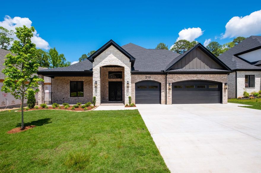 Rare Opportunity in Abington Court!  Don't miss the chance to own this stunning luxury home thoughtfully designed for elevated living. This home features a spacious, intuitive layout ideal for both everyday comfort and entertaining. The gourmet kitchen showcases custom cabinetry with lighted glass doors, flowing seamlessly into a full-size dining room crowned with a statement chandelier.  The great room is the heart of the home—anchored by a gas fireplace framed by built-in cabinetry. The main level includes the serene primary suite along with three additional bedrooms, each with its own ensuite bath. Step outside to enjoy a large covered patio with a built-in outdoor kitchen, all set within a fully fenced backyard that can accommodate a pool! Upstairs, a spacious bonus room includes a full bath, wet bar with sink, and drink cooler—perfect for game nights or guest stays.  And the property includes a whole-house generator for peace of mind!   Schedule your tour today!  Agents, refer to agent remarks.