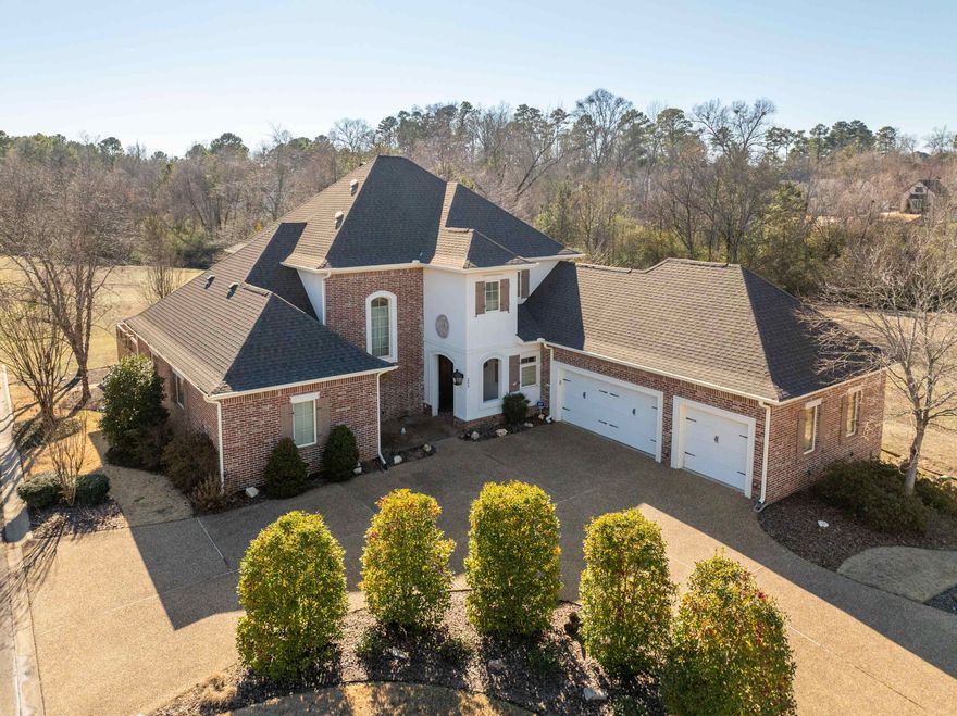 WELCOME HOME TO 203 CARRIAGE CREEK! Tucked in the back of Montclair Place Subd. in Lakeside School District this home has it all! Over 3300 sq ft of pure elegance with 4 Bedroom and 2 1/2 baths plus a separate office. Chefs dream kitchen with granite countertops, large kitchen island, induction stovetop and high end Bosch appliances. Master ensuite features Jason hydrotherapy bathtub and oversized walk in shower. Enjoy low utility bills with the geothermal system and 6 inch wall insulation, electric bills average about $125/month. 10 foot ceiling throughout main level with tons on natural light. Oversized bedrooms upstairs with tons of closet space and storage. Private back patio with flagstone pathway and remote awning to enjoy your afternoons. Property line extends beyond fence and back up to green space in subdivision so no one will build behind home. New roof and gutters in 2024, floored attic, sprinkler system and so much more. PROPERTY LINE EXTENDS BEYOND FENCE SO PLENTY OF ROOM TO EXTEND PLAY AREA OR ADD A POOL!