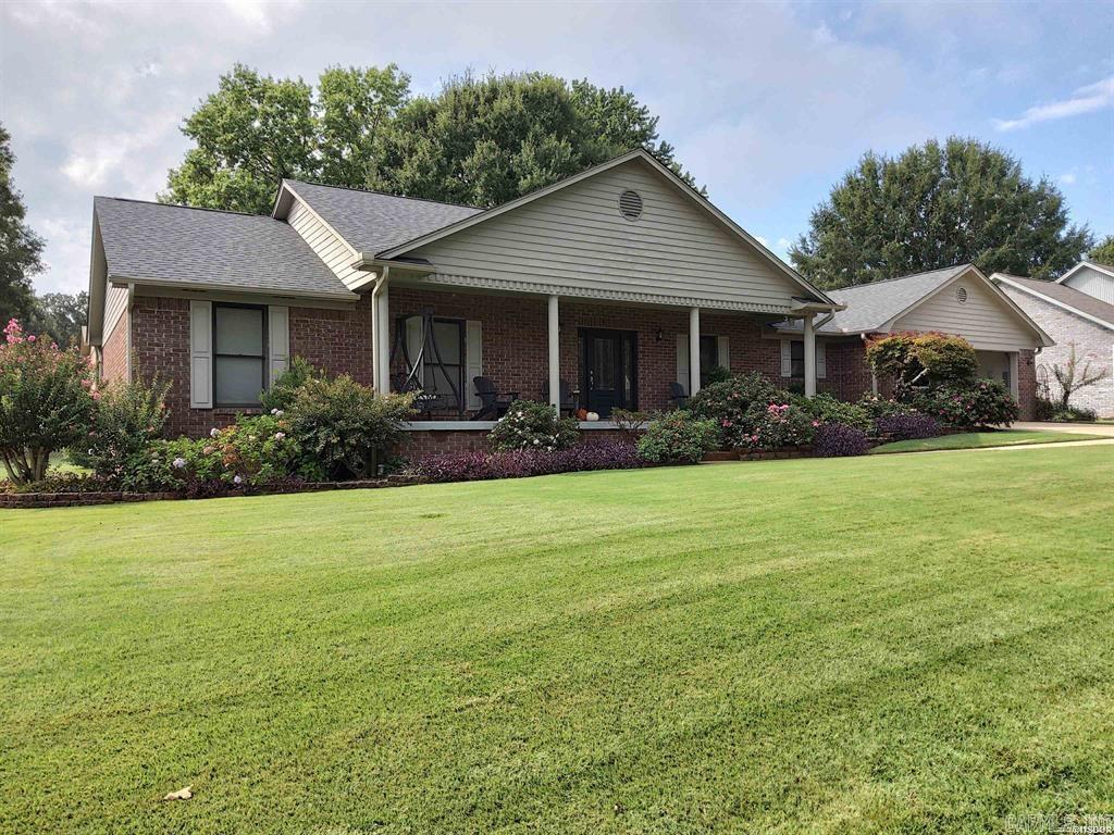 Lovely all-one-level home in Cherry Oak Subdivision! This 3 bedroom, 2 bath brick residence offers about 1,760 sq ft of thoughtfully updated living space built in 1993. Beautiful hardwood floors, a cozy gas log fireplace, formal dining room + breakfast nook give it character and charm. Numerous updates throughout, so you can move in with confidence and minimal fuss. Step outside to your covered patio perfect for relaxing mornings or evening gatherings, overlooking a meticulously landscaped yard that’s ready for entertaining. Refrigerator, washer, dryer, microwave, and a fire pit convey with the home — think cookouts and movie nights under the stars. (Check out Associated Docs for a complete list of Updates) This home sits on roughly 0.35 acres, in a community with lake access nearby, combining neighborhood feel with lifestyle perks. If you’re after charm, comfort, and a home that’s truly move-in ready, 129 Jennison Square is calling your name.