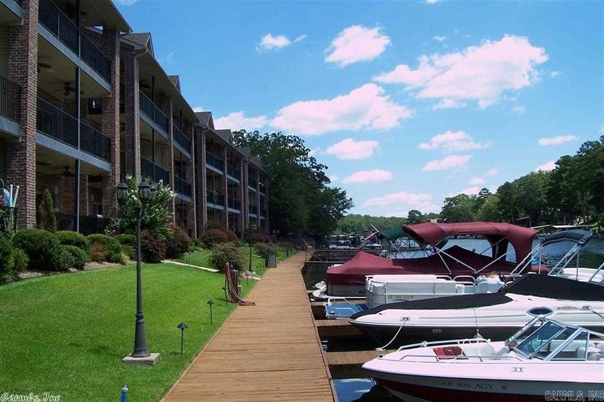 Really Nice Luxury Condo on Quiet Cove close to Everything! Walk out the back off the 8x32'patio 25' to the Lake!  Low utilities! Granite Counters in Kitchen, SS Fridge has ice & water in door, DW, Microwave, stove & instant hot water as well as a full size ice-maker by sink! tall ceilings and crown mold throughout!  Swim Platfrom and pavilion & waterfall. Fireplace w/gas logs.  Available April 1st.  $1195/mo Rent & Deposit is $1195. ( Some interior pics are of another condo with same floor plan)
