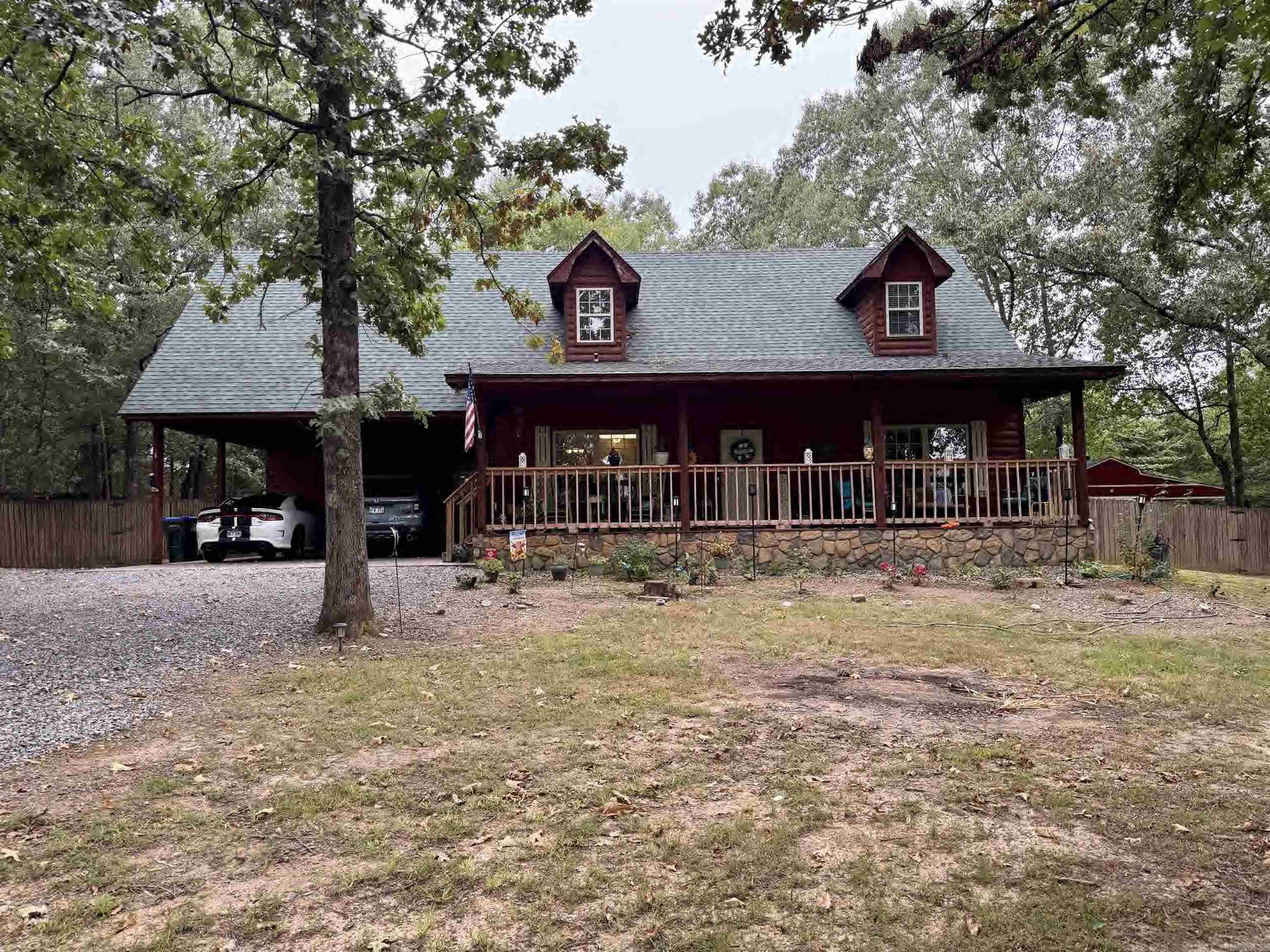 Discover the charm of country living with the convenience of town just minutes away! This 1,956 square feet log-sided home features 3 bedrooms and 2 full baths, perfectly set on a 1-acre lot filled with mature trees that provide both shade and privacy. Inside, youāll find a spacious layout with plenty of natural light and warm rustic appeal, making it an inviting place to call home. Outside, enjoy the peaceful setting, surrounded by beautiful trees and room to relax or entertain. All this is located only 5 minutes from downtown Greenbrier, giving you quick access to schools, shopping, and dining while still enjoying the quiet of a private retreat.