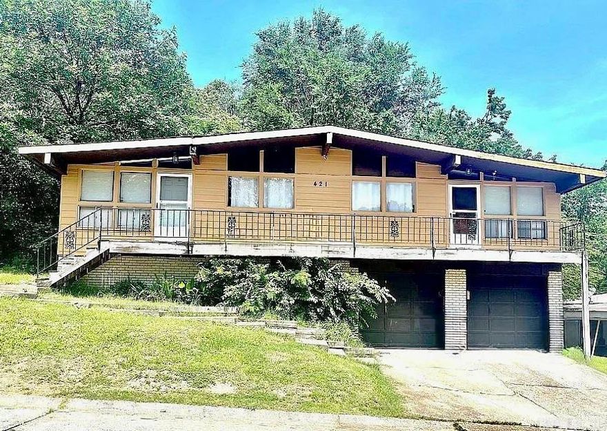 INVESTOR OPPORTUNITY! Duplex with one unit leased at $600/month (month-to-month) and one unit vacant—ready for a new tenant. Each unit is approximately 500 sq ft (1,000 sq ft total) with garage and off-street parking. Tenants pay all utilities and handle lawn care for low-maintenance ownership. Recent updates include new gas water heaters, updated plumbing and electrical, and HVAC units approximately 4 and 6 years old. Roof is approximately 10 years old. Refrigerator and stove convey; washer/dryer belong to tenant. Current annual income is $14,400 with projected rents of $600–$650 per unit. Taxes approx. $1,066/year and insurance approx. $1,200/year. Estimated CAP RATE approximately 7%–8% based on projected rents and typical expenses.