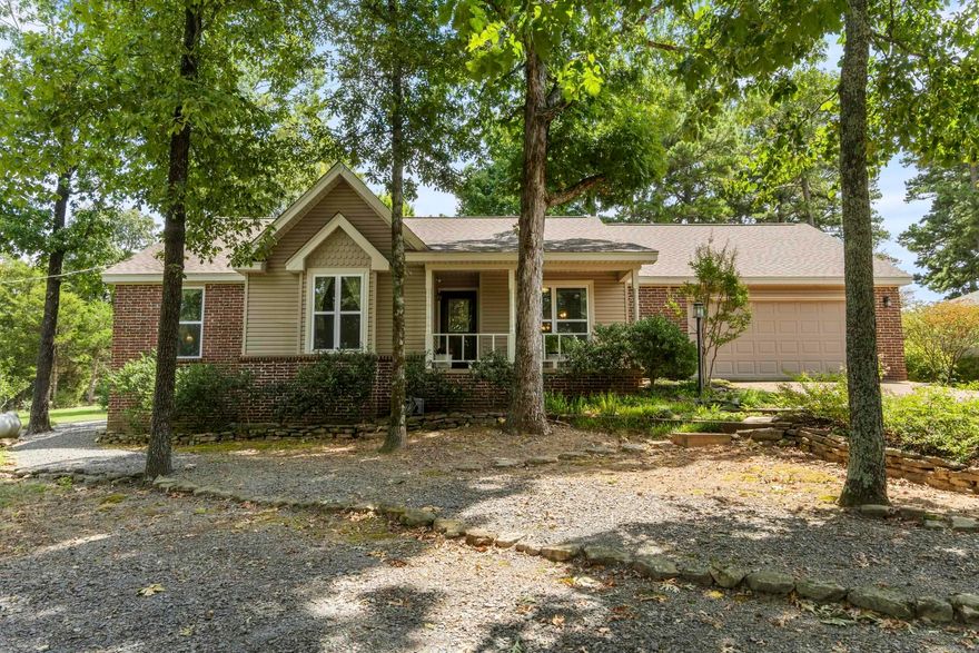 Fantastic opportunity to purchase this well maintained home on Indian Hills Golf Course.  COMES WITH A BEAUTIFUL GOLF CART AND RIDING MOWER AND PUSH MOWER.  Enjoy morning coffee or evening gatherings on the expansive stone patio while you watch golfers pass by—an effortless setting for outdoor entertaining. A detached golf-cart barn adds convenience, & the oversized garage includes a workshop area for projects & storage. Thoughtful maintenance & recent big-ticket updates make this truly move-in ready. Close to all Fairfield Bay amenities & approximately 15 minutes to Greers Ferry Lake—golf in the morning, lake in the evening...Fairfield Bay offers 3 swimming pools, pickle ball, tennis, atv/utv trails, bowling, hiking/biking trails. This is a great location & community for people who work from home with fiber internet. The triple lot provides privacy.  Notable updates: 2025: New heat pump; new washer & dryer (to convey) 2024: Septic system serviced 2023: Kitchen appliances upgraded; crawlspace sealed  2021: Windows, Leaf Filter gutter protection; new water heater 2020: New roof; detached golf-cart barn added; stone patio installed. Schedule your appointment today to view this home.