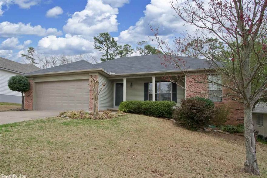 Spectacular. Shows like new! Updated carpet, tile floors in baths, interior paint, kit cabinet knobs. New roof & garage door 2010.  Beautiful kitchen w/white cabinetry, bkf bar & dining area w/french door out to back deck overlooking a nice level privacy fenced backyard. Lg. GR w/FP & french door to back deck. Master suite w/luxury bath - jetted tub, sep. shower & 2 walk-in closets. Sep. laundry room. Tray ceiling in Kit/dining area, GR & Master BR.  Heated & cooled room in garage could be an office.