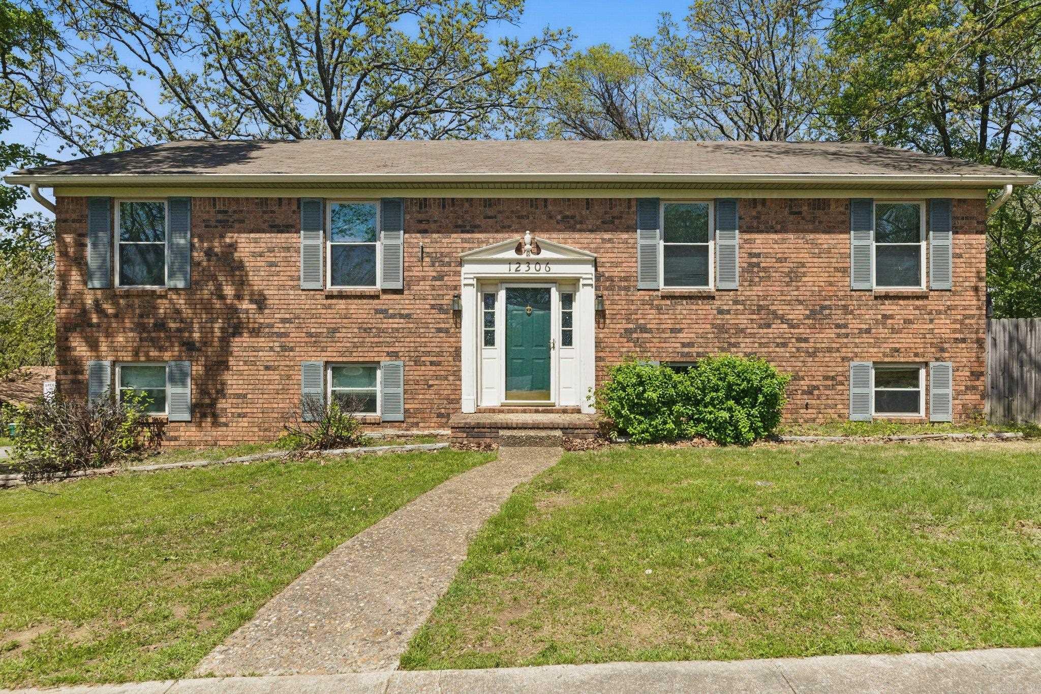 Smack dab in the heart of West Little Rock and close to everything that IS West Little Rock, sits this terrific home -- priced to sell with room for your very own magical touch! This is very large home at over 2600sf with THREE bedrooms, PLUS an OFFICE, and a GIGANTIC "BONUS/PLAY" room. There's a HUGE LIVING/DINING room for entertaining, and BIG FAMILY room with fireplace, and the KITCHEN has plenty of room for EATING-IN. Enjoy the wonderful DECK and the lower PATIO when the weather is nice. Have sweet dreams in the massive primary bedroom with a very large walk-in closet and ensuite bathroom. Great CORNER LOT with side loading 2-car garage. Laundry room. BRAND NEW carpet installed. AGENTS: See Remarks.