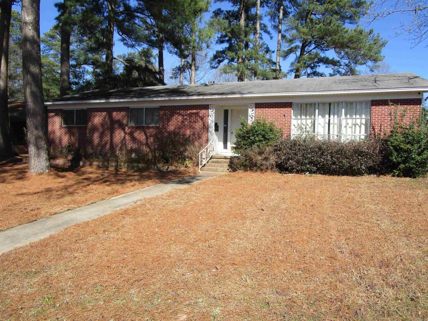 This is a 3 bedroom, 2 bath home with new paint and  new laminate flooring. All of the light switches and outlets have been replaced as well as new fans in all the rooms. Give me a call to take a look.