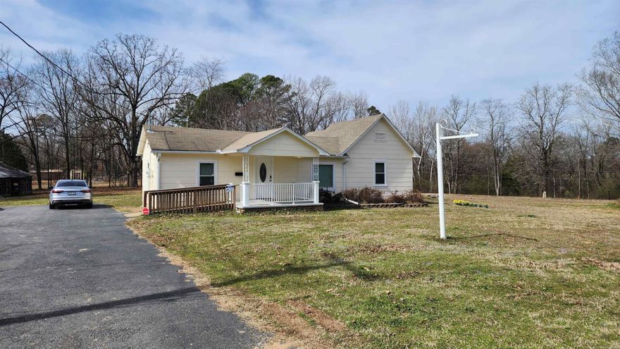 Great location for your business! 1.14 Acres already zoned commercial and the adjacent 0.84 Acres that could be rezoned commercial if the city of Bryant approves your project. There is a 30 foot right of way for Springhill Road which leaves about 1.75 Acres of usable land.