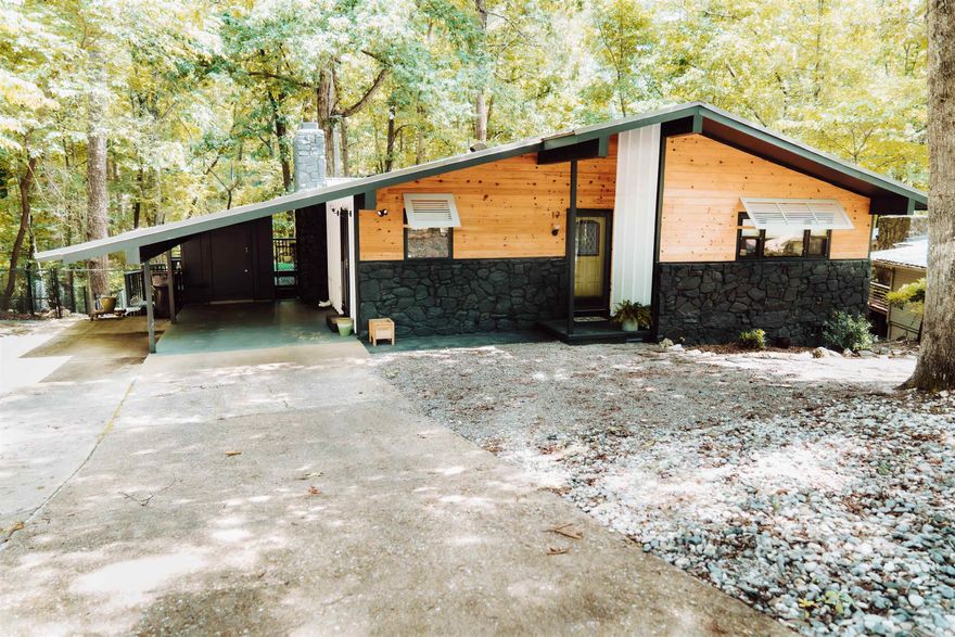 Modern  comfort meets cozy charm in Hot Springs Village! This inviting 2 bedroom, 1.5 bath home offers a stylish contemporary feel with clean lines and warm touches throughout.  Enjoy peaceful mornings on the deck surrounded by nature.  Located in a quiet, desirable area of Hot Springs Village with easy access to amenities- this is truly a dream and perfect place to call home!