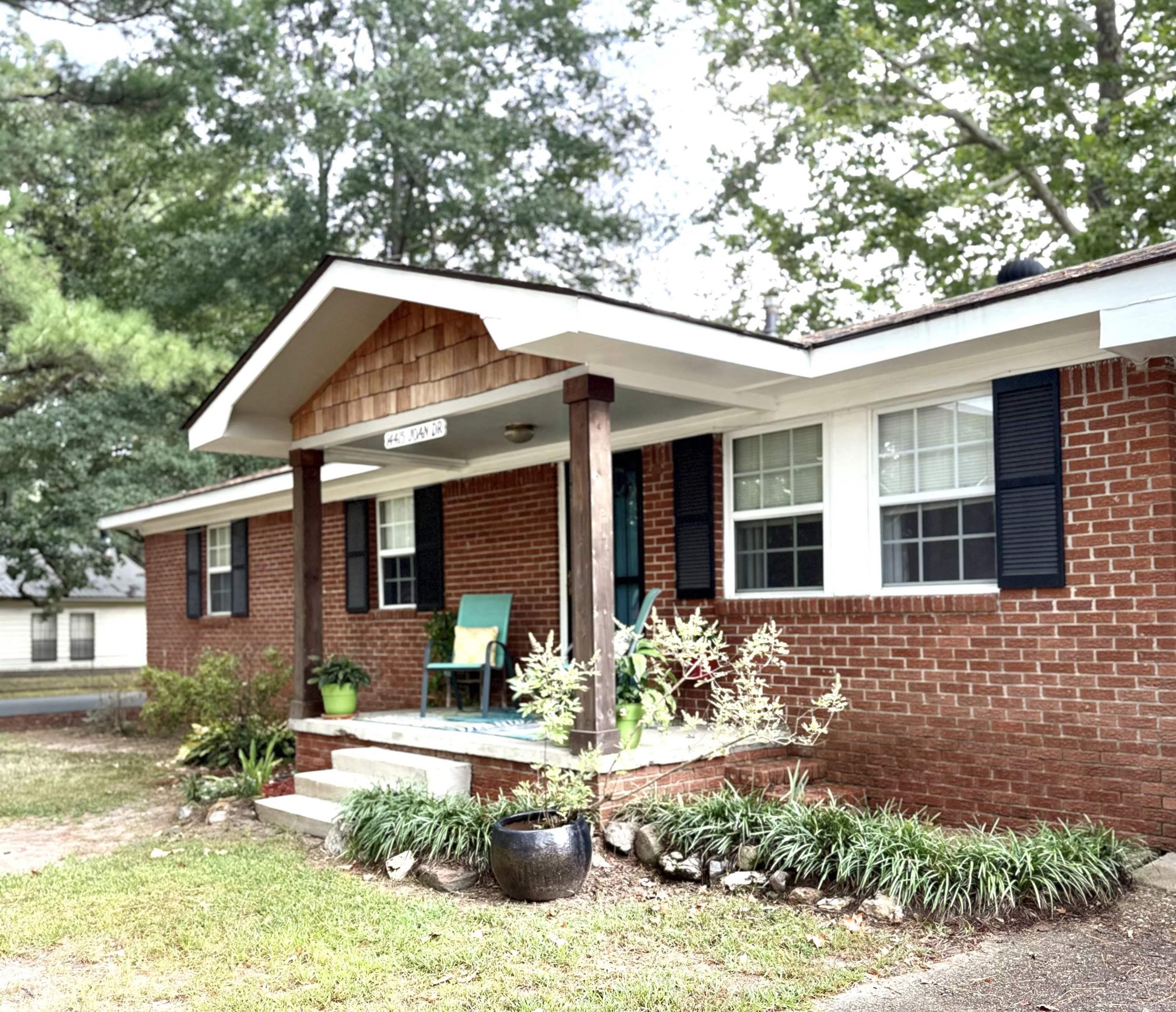 Located in the highly sought-after Bryant School District, this charming brick ranch in Shannon Hills offers 3 bedrooms, 2 full baths, and a bonus room that could serve as a 4th bedroom, office, or playroom. The home was updated in 2023 with new flooring, remodeled bathrooms, shake shingles, and wood pillars on the front porch. Enjoy a spacious laundry room, a 10x10 brick storage building with electricity and a new metal roof (2023), and a brand-new privacy fence. The hot water heater was replaced in December 2022. Attic has 18 in of spayed insulation. Refrigerator, washer, and dryer convey with an acceptable offer. Conveniently located just minutes from Little Rock, Bryant, and Benton, this property combines charm, updates, and location at an affordable price.PROFESSIONAL PHOTOS COMING