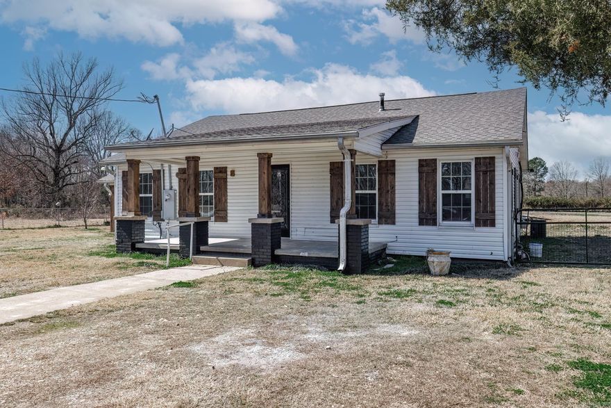 Welcome to your charming countryside retreat in Curtis, AR! This delightful 3 bedroom, 2 bath home is nestled on nearly 2 acres of lush land, offering a serene escape from the hustle and bustle of city life. Almost fully remodeled, this home boasts a host of upgrades that ensure modern comfort and convenience. Step inside to discover a freshly rejuvenated interior, featuring new electrical wiring, updated plumbing throughout most of the home, a brand new roof, and freshly installed sheetrock and subflooring. The spacious layout encompasses a welcoming living area, perfect for cozy evenings spent with loved ones, while the adjacent kitchen awaits your culinary adventures with its ample space and potential. Outside, the vast acreage provides endless possibilities for outdoor enjoyment and expansion, with room for gardening, recreation, or simply soaking in the tranquility of nature. Plus, a convenient outbuilding offers additional storage space for all your tools and equipment. With its prime location and thoughtful renovations, this home presents a rare opportunity to embrace the rural lifestyle without sacrificing modern comforts.