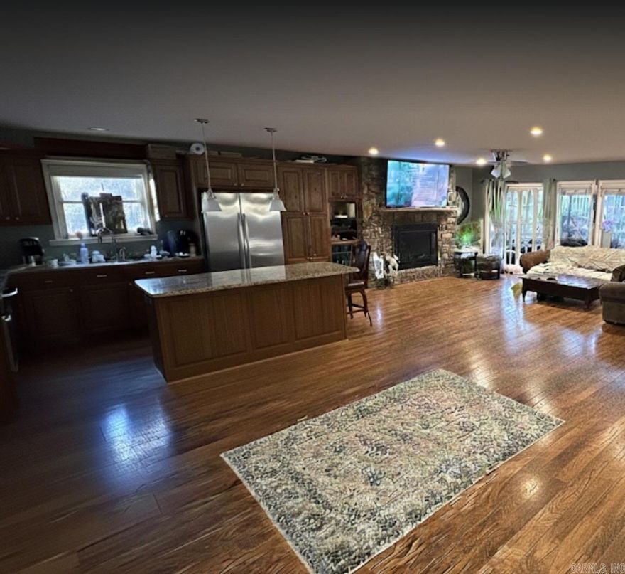 This beautiful 3-bedroom, 2-bath home offers 2,100 sq ft of comfortable living in a quiet neighborhood of Hot Springs Village. The two-story layout provides space and privacy, while the fenced backyard is perfect for pets, play, or relaxing outdoors. Enjoy year-round views from the Arkansas room on the back porch—an ideal spot for morning coffee or evening unwinding. The home has been well cared for and is truly move-in ready, with all appliances conveying to the new owner. A perfect blend of charm, functionality, and peaceful surroundings.