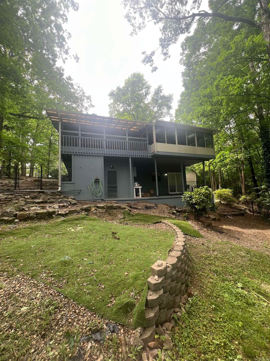 This beautiful 3-bedroom, 2-bath home offers 2,100 sq ft of comfortable living in a quiet neighborhood of Hot Springs Village. The two-story layout provides space and privacy, while the fenced backyard is perfect for pets, play, or relaxing outdoors. Enjoy year-round views from the Arkansas room on the back porch—an ideal spot for morning coffee or evening unwinding. The home has been well cared for and is truly move-in ready, with all appliances conveying to the new owner. A perfect blend of charm, functionality, and peaceful surroundings.