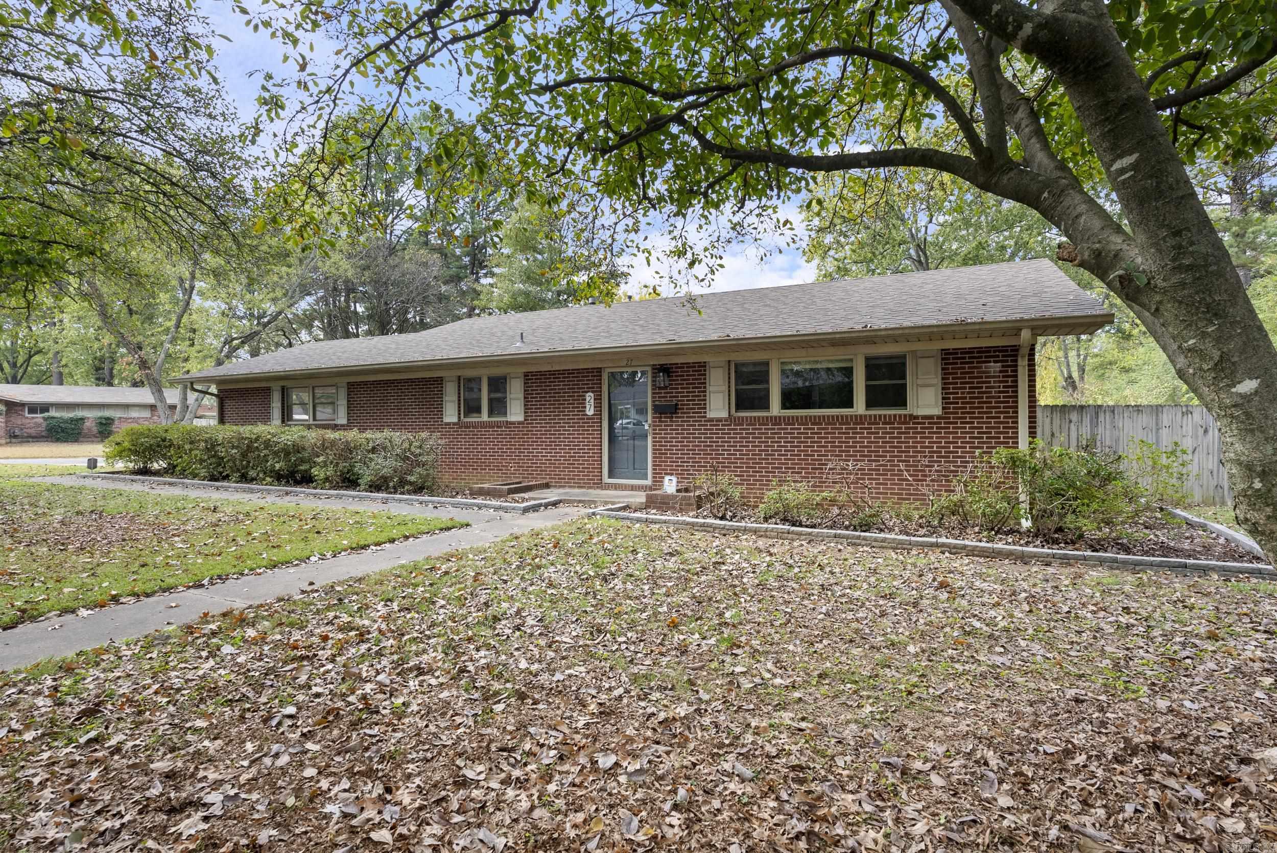 Walking distance to UCA, CBC and downtown Conway. This adorable home is a rare find in West Conway and features a large living area, dining area with built-in, corner lot, new roof in last 2 yrs, New HVAC in 2021, HWH in 2022, vinyl windows, and new flooring in wet areas. Outside you will find a Side entry carport with storage, mature trees, quiet neighborhood, and fully fenced yard. This is a perfect opportunity for first time buyers or investors. Washer, dryer and refrigerator will convey. Schedule your showing today!