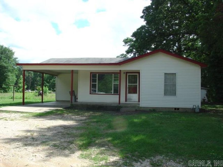 2 BR located at end of street has shop building and 1.59 acres.  Room for garden or another house or two.  See confidential remarks.
