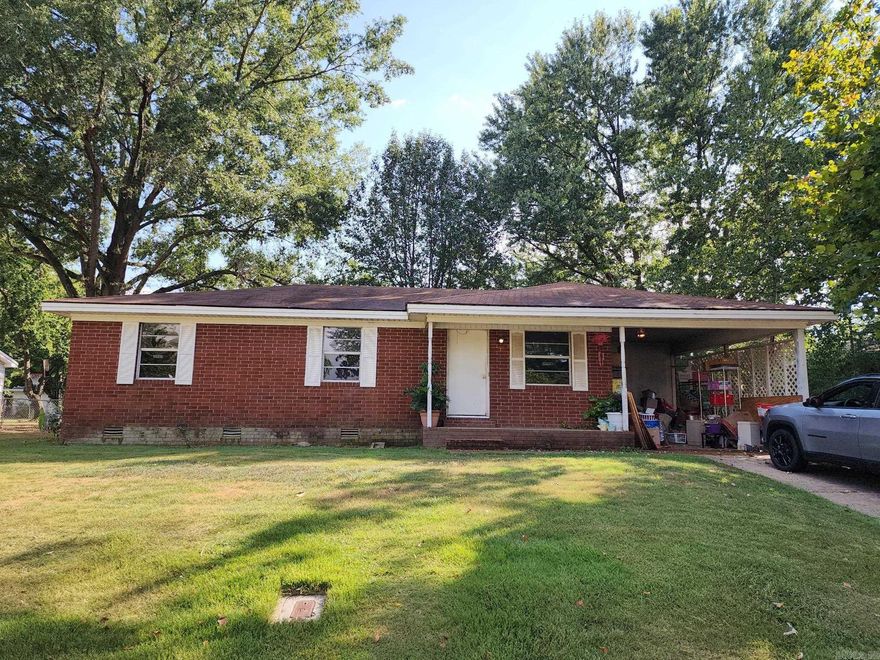 A true fixer upper! This house has been 1/2 gutted & has no cabinets. It still needs more subfloors, floor joist repair, flooring, all electrical updated, some plumbing, sheetrock, roof, windows, appliances, HVAC & a lot of cleaning & pressure washing to make it new again. Good neighborhood, 1 car carport, fenced in back yard with lots of shade.