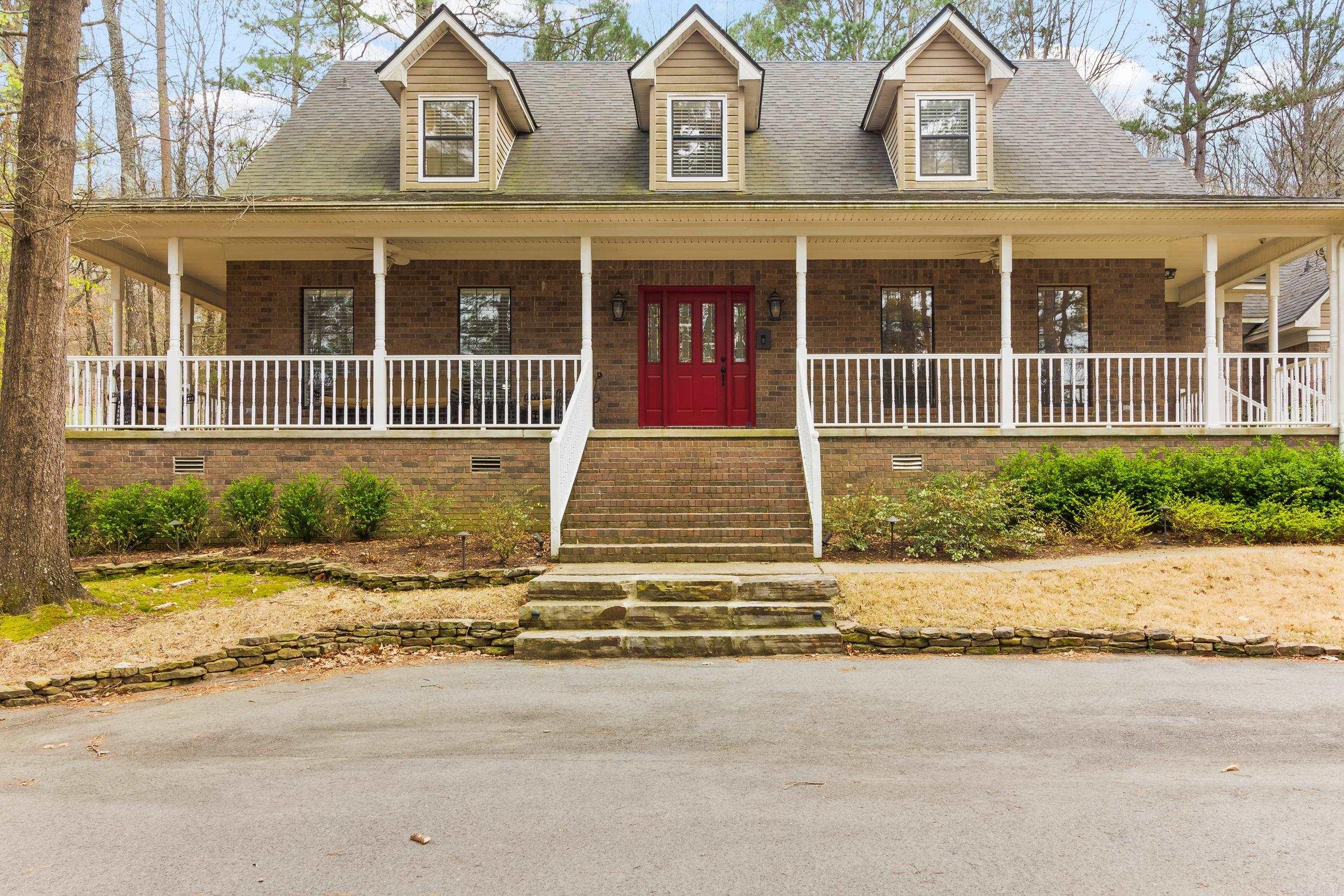 Welcome home to 20 Witness Tree Lane in West Little Rock. This updated and beautiful home sits on 5 private acres! Enjoy this spacious home in your private oasis just minutes from all Little Rock amenities. 5 bedroom brick house with wrap around porch sits in the center of the wooded 5 acres, with over 350 undeveloped acres nearby providing peace and quiet. New roof 2017. Two new HVAC units. Updated kitchen with quartz countertops, updated master bedroom and bathroom, beautiful wood flooring. Master and guest suites on the main level, kitchen has over-sized Sub zero refrigerator, tons of cabinets, large island, lots of living space in great room & playroom, 3 bdrms upstairs, plenty of closet space, 3 car garage attached and 2 car detached garage/shop. Enjoy watching the deer on your own property. Has all you have been looking for! Rick Ferguson built home. See agent and showing remarks.