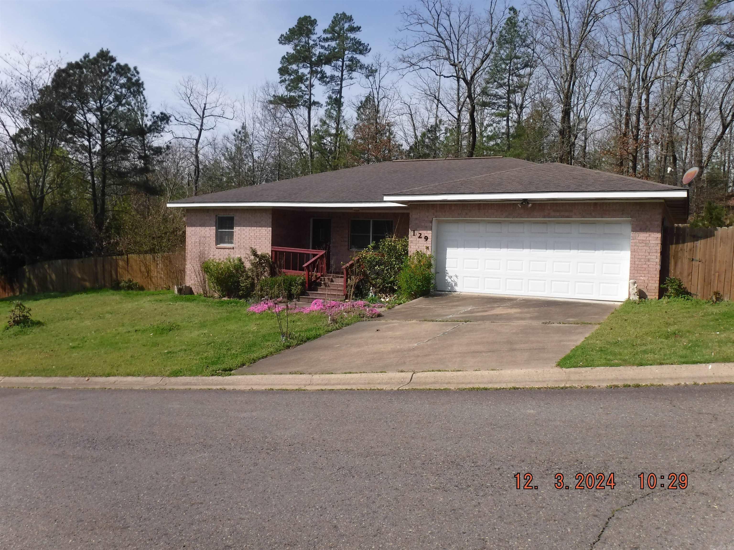 All brick home in Lake Hamilton SD. Sky Canyon Trl is a cul-de-sac street with very little through traffic. Just mins from Hwy 270W,Harps grocery store, and Wal-Mart. Convenient to NPCC, Lake Hamilton, dining. This one level home features 3 bedrooms. Two full bathrooms. Two car garage. Almost zero entry from garage into house. Fully fenced backyard with deck and storage building. Inside you have a semi open kitchen/living room/dining room spaces and a split floorplan with the master suite on one side and the additional two bedrooms and bath on the other. The kitchen has granite with stove, microwave, dishwasher, and refrigerator all conveying.