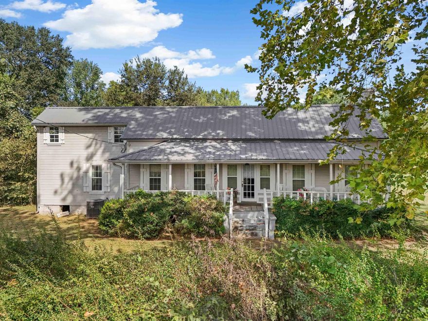 Welcome to this very unique 4 bed 2 bath home, nestled in a quiet country setting this home sits on a beautiful 8.98 acres. there are two sheds, a small barn, and a storage area off the carport. the land is fenced and gated, ready for your livestock. There are deer constantly moving around the property. The home was originally a dog trot built in the 1800's.  It has been added onto and upgraded; the roof and HVAC system are only a few years old.  There is city water and a working well on the property, perfect for watering livestock or watering a garden.
