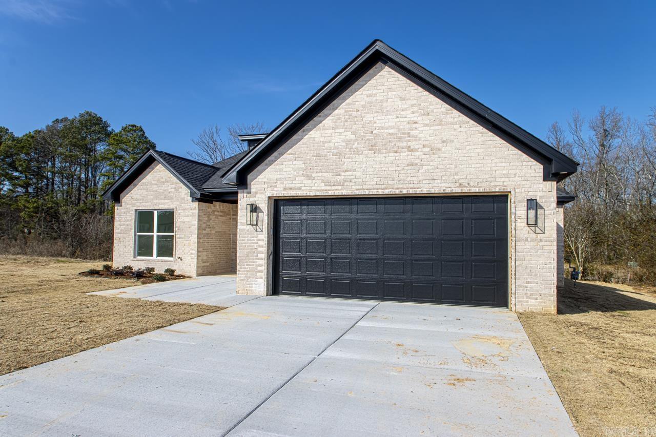 One of Bryant's Newest subdivisions. Come check out this 4-bedroom home with a relaxing back porch. This home has some extra trim throughout with tongue and groove ceilings in the living and custom beams in the primary bedroom. Access from the primary closet to the laundry makes those chores easier. Make your appointment today!