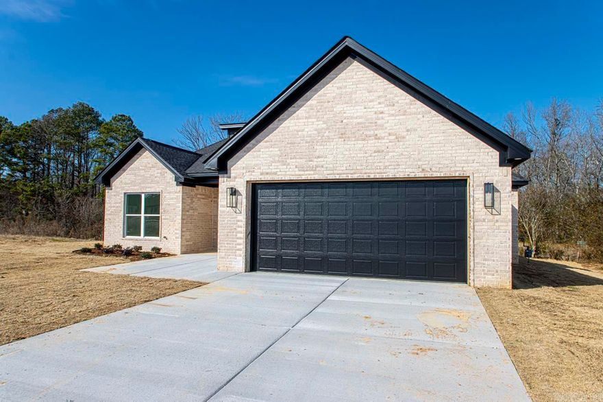 One of Bryant's Newest subdivisions.  Come check out this 4-bedroom home with a relaxing back porch.  This home has some extra trim throughout with tongue and groove ceilings in the living and custom beams in the primary bedroom.  Access from the primary closet to the laundry makes those chores easier.  Make your appointment today!