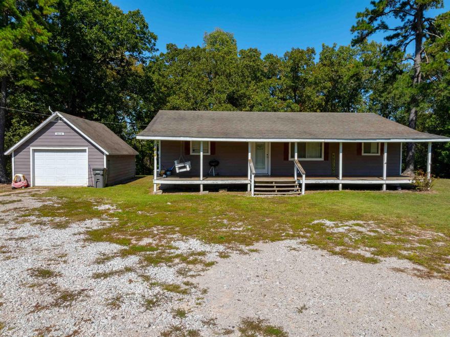 PEACEFUL EASY LIVING!  Escape to the tranquility of the countryside with this charming 3-bedroom home situated on a spacious 1.75 +/- acre lot. As you pull in, you'll immediately feel the sense of serenity this property offers, starting with a large front deck, perfect for enjoying your morning coffee or hosting family and friends while taking in the peaceful surroundings.  A detached garage provides a dedicated space for parking, storage, or a workshop—perfect for those who need extra room for hobbies or equipment. The large yard offers plenty of possibilities, whether you dream of gardening, outdoor recreation, or just enjoying the wide-open space. To the side of the property, you'll find a barn-like structure that can be used for chickens and/or goats.  Located just minutes from the popular B-Rock swimming hole, this home offers the best of both worlds: the peacefulness and privacy of country living, while being just a short drive from town amenities.  Don’t miss out on the opportunity to make this charming country retreat your own!