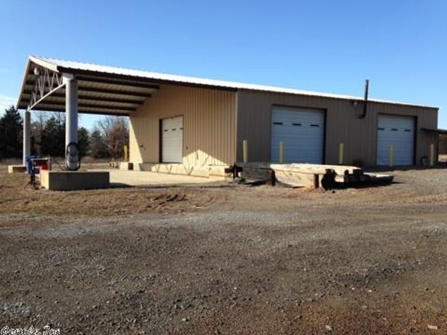Multiple income opportunities all on one piece of property on Hwy 65 North with highway frontage! Perfect for Gas/Oil field companies or open ended to investment opportunities. Property includes 50x75 shop with 5 extra tall overhead doors, electricity and water, 12x50 mobile office building, 8 spot RV park, unique 2000+ sq ft house along with many other useful structures on 25.39 acres. Call for any additional details. (See agent remarks.)
