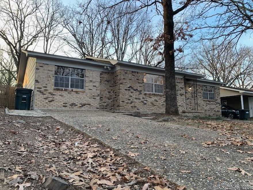 This home, conveniently located in a calm neighborhood, and close to the heart of Sherwood, has recently been painted and new flooring installed throughout.  The carport was converted into extra living space and could be used as an additional living room or bedroom with its own half bath attached.  Other updates include water heater and light fixtures.  The back yard offers seclusion and a little shop/storage building with power hookups.  Priced to sell quickly, schedule a showing while this gem is still available.