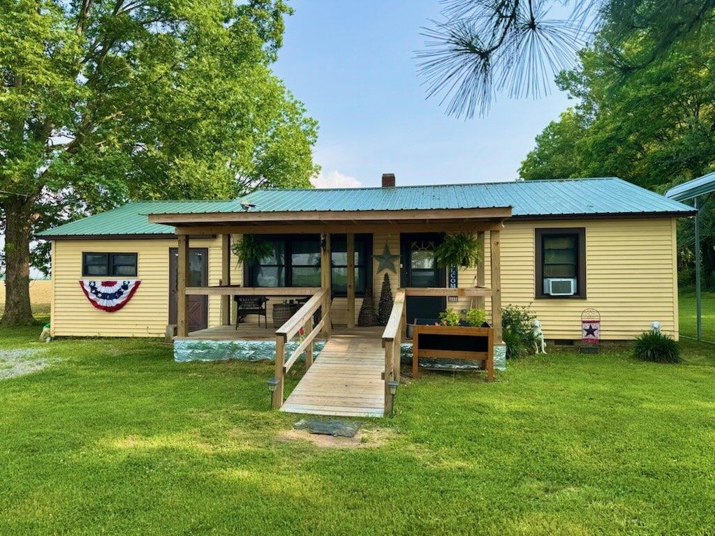 3022 Greene 415 Rd is new to the market! This lovely farmhouse sits on One +/- acre. This is a 3 bedroom, 1 bath home that features a large kitchen and eating area. Off of the kitchen is a den that could also be an extra bedroom. The shop building can be used as a two-car garage or a workshop. There is also a covered canopy for additional parking. The electrical and plumbing has been replaced and updated. Don't miss this opportunity to experience the beauty. It's so peaceful and quiet here. You will enjoy sitting out on the front porch and breathing in the fresh air.