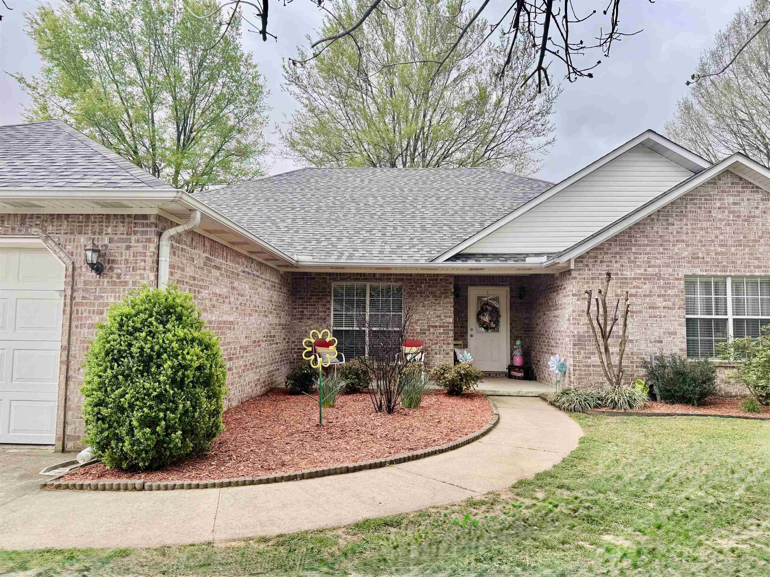 Welcome to 3004 Stonegate Drive in Paragould, Arkansas! This spacious 2,248 sq. ft. home offers the perfect balance of comfort and functionality with four bedrooms, two bathrooms, and a thoughtfully designed layout. Step inside to discover a versatile dining room, currently used as a cozy mini living room, providing extra space for relaxation or entertaining. The large master bedroom serves as a peaceful retreat, while the additional bedrooms offer flexibility for family, guests, or a home office. A two-car garage provides ample storage and parking, and the home's inviting design makes it perfect for modern living. Nestled in a desirable neighborhood, this property is a must-see for anyone looking to call Paragould home!