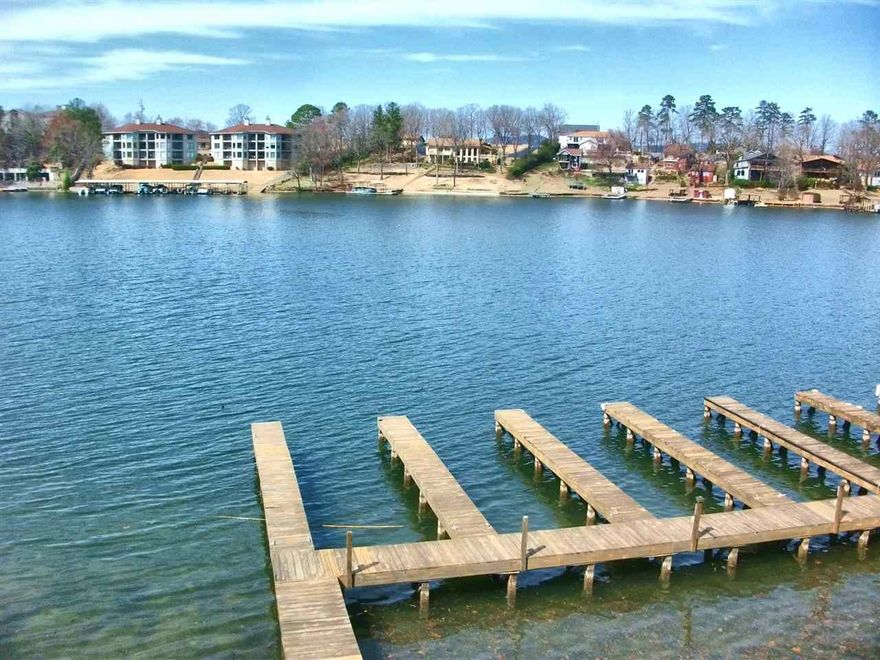 GREAT VIEWS!! FROM THIS 2BR. 2BA. LAKE CONDO W/1,320 SQ.FT. IT HAS THE LOOK OF THE CARIBBEAN WITH THIS UNIQUE DECOR. FEATURES INCLUDE WALK-IN STEAMED SHOWER, ELEVATOR, POOL AND BOARDWALK W/ BOAT TIE UP.