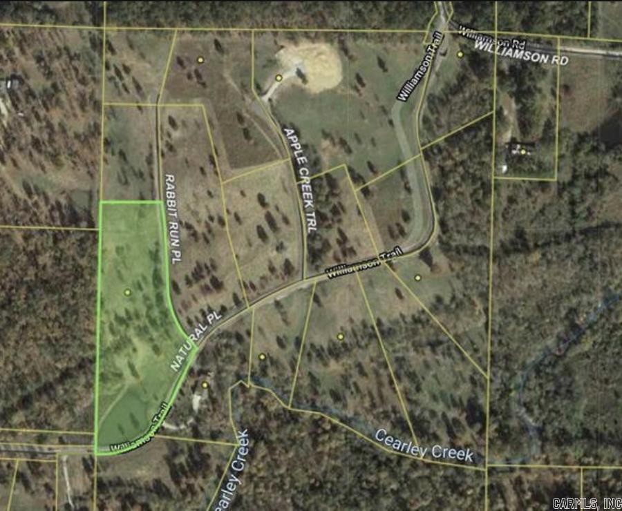 Welcome to your slice of paradise nestled in the heart of the hills! This exceptional 4.56-acre lot boasts breathtaking views that extend as far as the eye can see, providing the perfect backdrop for your dream home. Whether you envision a hilltop retreat or a tranquil haven near the serene pond, this property offers endless possibilities. Located in the Lake Hamilton School District, this rare parcel combines natural beauty with convenience, featuring electricity already on-site and permits in place for septic and well locations. Don't miss this incredible opportunity to turn your vision into reality and create a home where every day feels like a getaway!