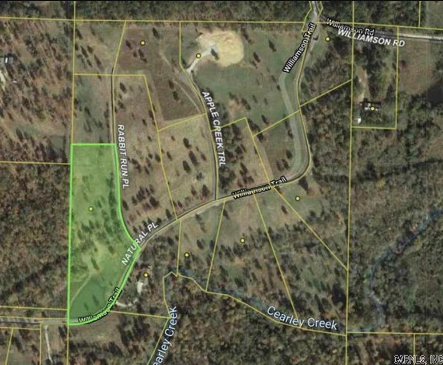Welcome to your slice of paradise nestled in the heart of the hills! This exceptional 4.56-acre lot boasts breathtaking views that extend as far as the eye can see, providing the perfect backdrop for your dream home. Whether you envision a hilltop retreat or a tranquil haven near the serene pond, this property offers endless possibilities.  Located in the Lake Hamilton School District, this rare parcel combines natural beauty with convenience, featuring electricity already on-site and permits in place for septic and well locations. Don't miss this incredible opportunity to turn your vision into reality and create a home where every day feels like a getaway!