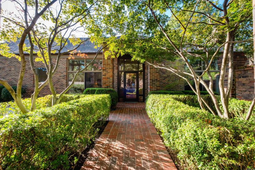 Elegant condo in gated Riverbend community offering privacy and security. Features 10’ ceilings, floor-to-ceiling windows, and site-finished hardwoods throughout. Open, light-filled layout with two living areas and formal dining. Chef’s kitchen with slab quartzite counters and backsplash, Bosch dishwasher, and bar with beverage fridge. Four ensuite bedrooms—two on main level, two guest suites up. Custom moldings, solar-protected windows, and multiple courtyards. Private walkway and pier to the river with views of the bluffs and downtown skyline. Side-entry garage with sink, heated & cooled storage, copper gutters, and new insulation. Exclude chandelier in the dining room. Walk in storage room as well!