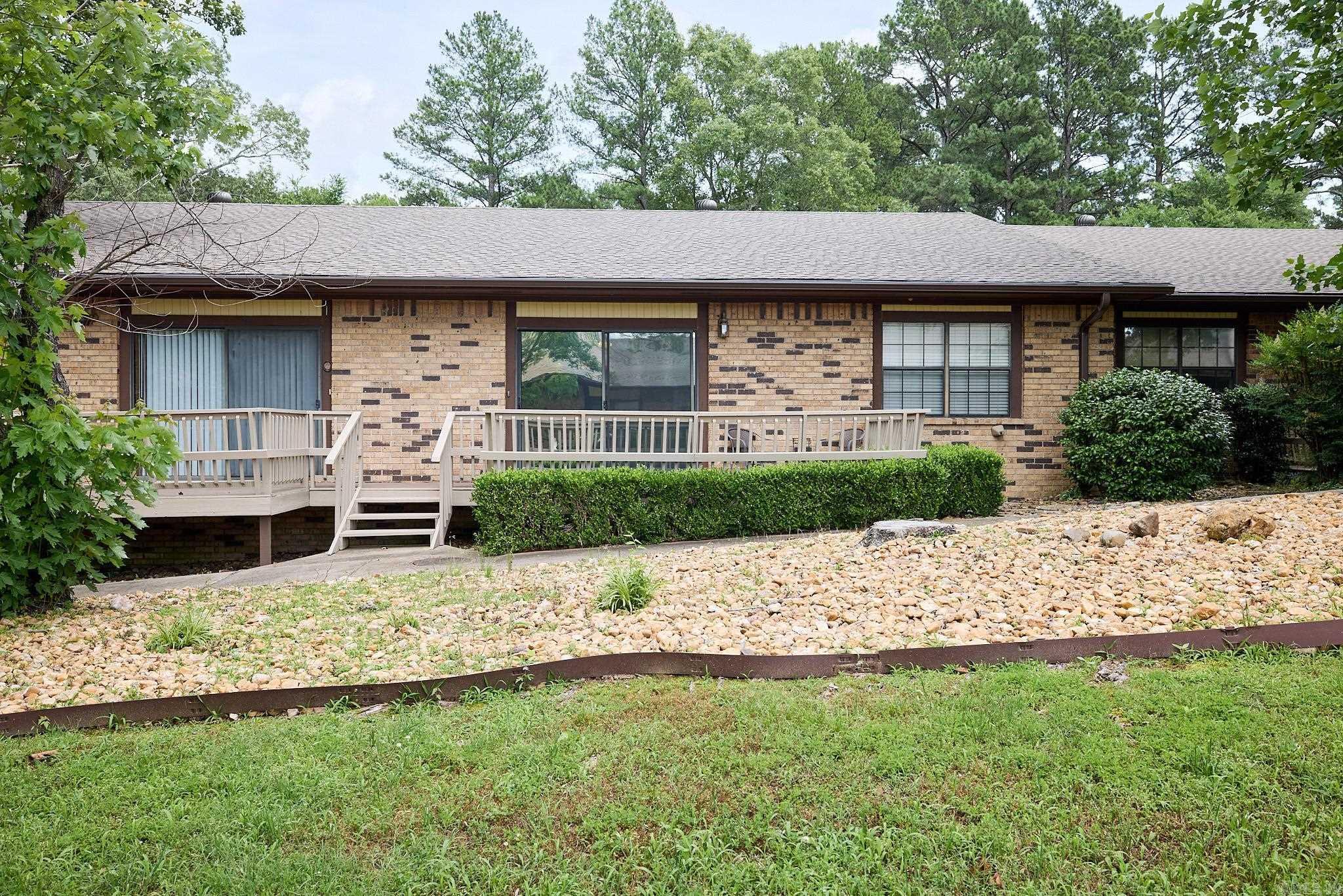 With convenient access to all things in Hot Springs, this condo is the perfect retreat! Nice storage throughout to include a spacious kitchen with ample cabinet and counter space. You will love the front porch and back deck, as well as the two covered parking spaces.