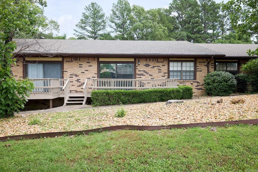 With convenient access to all things in Hot Springs, this condo is the perfect retreat! Nice storage throughout to include a spacious kitchen with ample cabinet and counter space. You will love the front porch and back deck, as well as the two covered parking spaces.