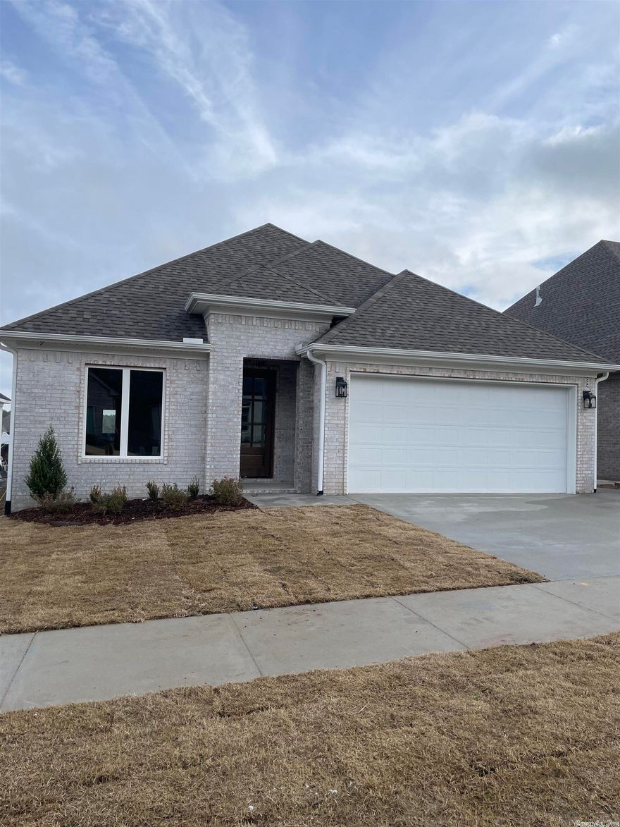This highly desirable new construction home is located in Chenal's Fletcher Ridge Subdivision. This 3BR/2BA retreat offers a spacious kitchen, tankless hot water heater, walk-in pantry and 2 car garage. Outside features include covered patio wired for tv, sprinkler system with zoysia sod and gutters all around. Prewired for external security cameras. Conveniently located to West Little Rock amenities. This home will be your favorite place to call home!  Taxes based on unimproved land.