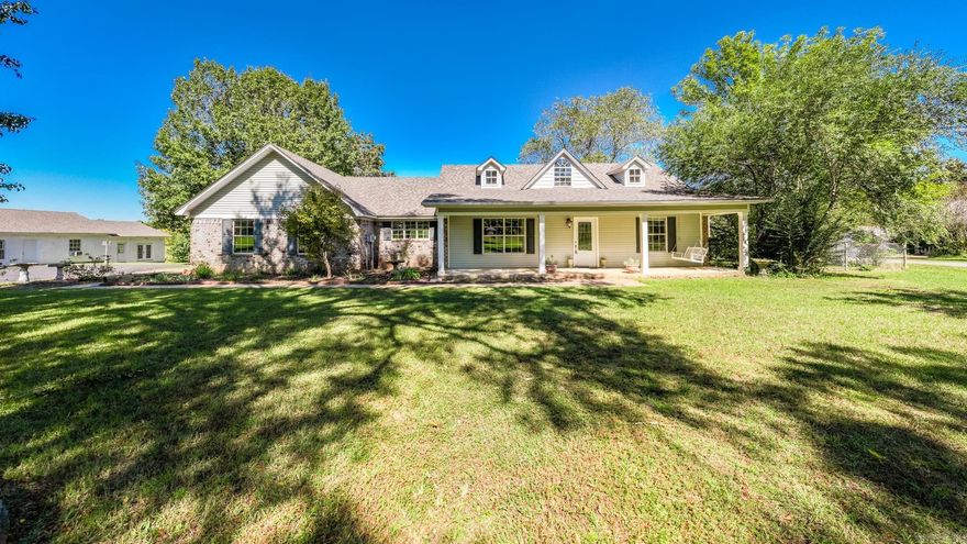 HOME, GUEST HOUSE AND 6 ACRES with a POND!!! The tree-lined driveway leads to a 4 bedroom, 2-1/2 bath main house with a large studio guest house with a full kitchen and bathroom. Bring your horse, chickens and in-laws because there's a place for everyone on this beautiful property that lays just outside of Conway.