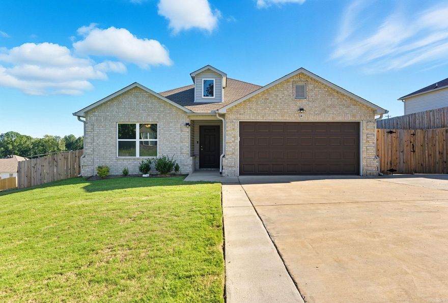 Welcome to 14 Erwin Dr — a beautifully maintained 3 bed, 2 bath home offering 1,392 sq ft of comfortable living in a quiet neighborhood in Austin, AR. This move-in ready home features an open-concept layout, stylish white cabinetry, granite-look countertops, and sleek black appliances. The backyard is fully fenced and includes a covered patio with ceiling fan, extended concrete pad, and a modern storage shed — perfect for entertaining or relaxing. Additional highlights include luxury vinyl plank flooring, a spacious 2-car garage, and excellent proximity to Hwy 67/167 and Cabot Schools. Come see why this home is the perfect blend of function and charm!
