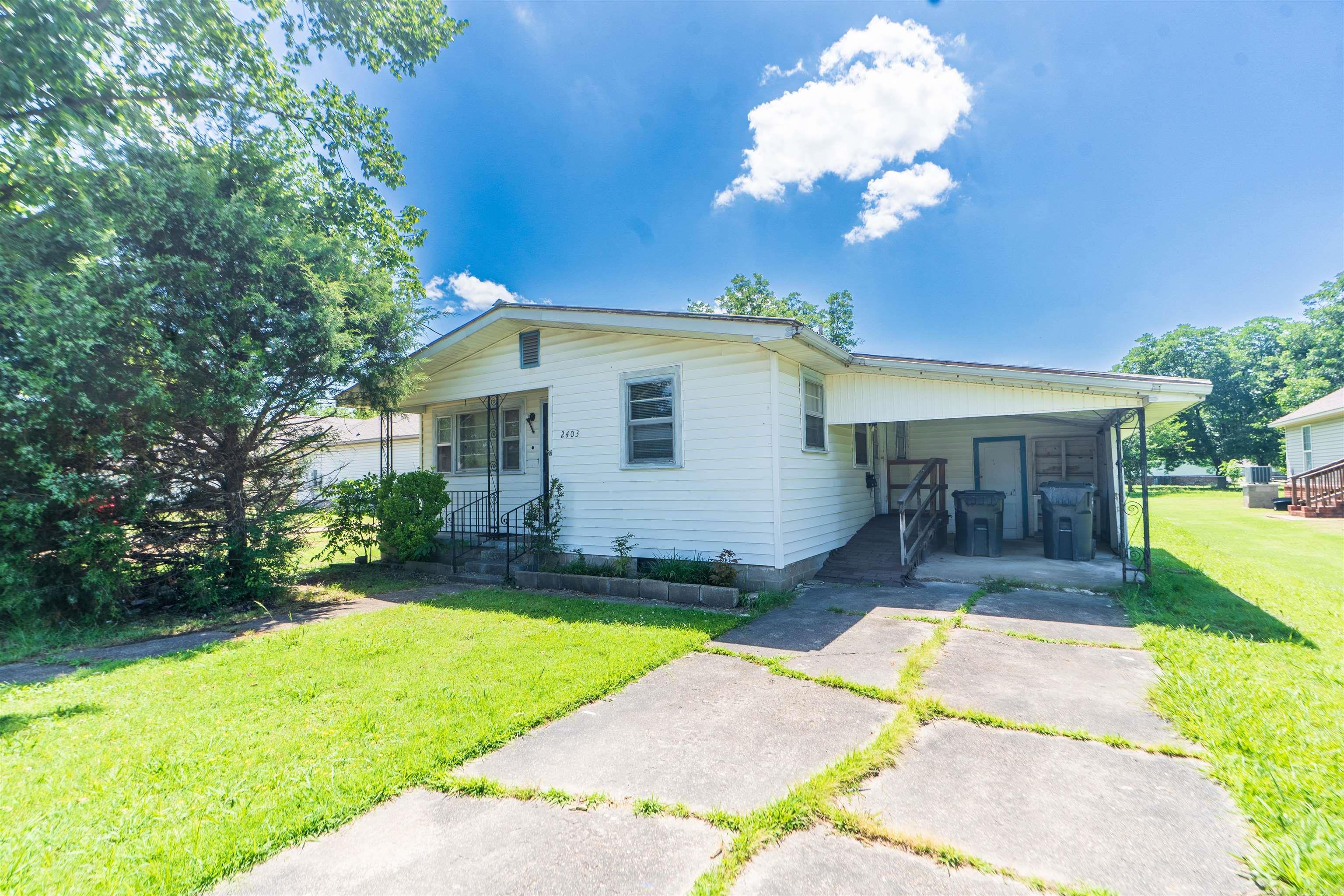 Welcome to 2403 High St—an ideal opportunity for first-time buyers or investors! This 3-bedroom, 1-bath home offers a functional layout with a spacious living room, dedicated dining area, and a large kitchen with plenty of cabinet space. Natural light flows throughout, highlighting the original charm of the home. Outside, enjoy a deep backyard perfect for gardening, pets, or future projects. Located in the heart of Jonesboro’s Nettleton area, you’ll be just minutes from schools, shopping, parks, and downtown. Whether you're looking for a home to live in or a great rental property to add to your portfolio, this one has solid potential. Property is being sold as-is. Don't miss your chance to own a centrally located home in Jonesboro at an affordable price—schedule your showing today!