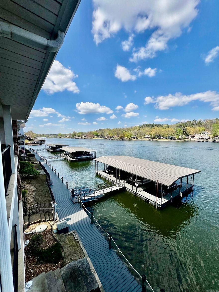 Highly desired condo complex in deep water cove.  One of the largest units. No short-term rentals. Entire upstairs master suite.  Two additional bedrooms on main level. Start your summer fun on Lake Hamilton. Two balconies. Gated complex with pool, hot tub, and clubhouse party room and restrooms. No boatslip, short term tie-ups allowed on existing docks and Hot Springs Marina less than 1/8 mile down cove.