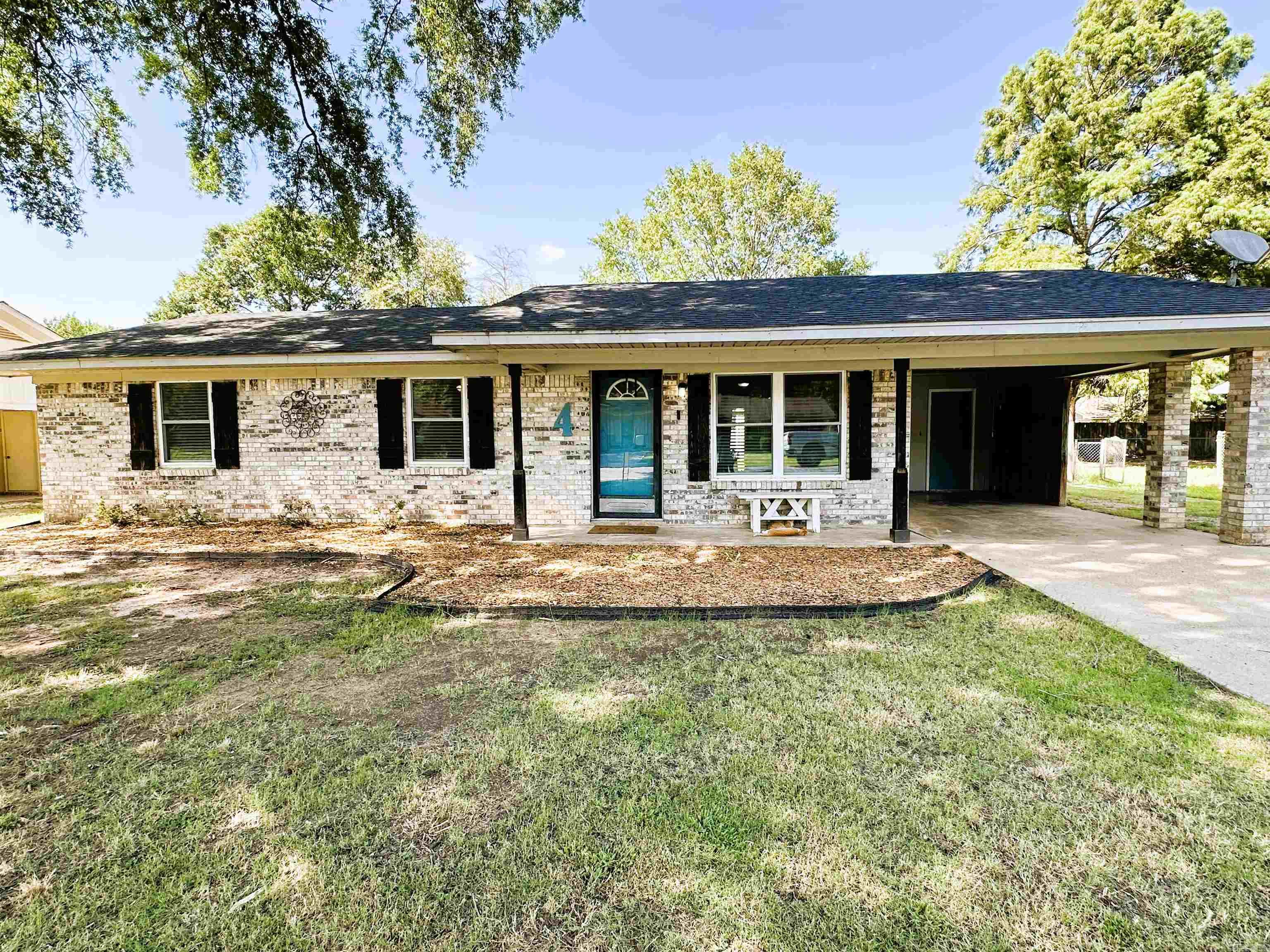 Looking for a cozy move-in ready home nestled in a quaint neighborhood? This is the one! This attractive updated home features 3 bedrooms, 1.5 bathrooms, a spacious laundry room, eat in breakfast nook, a covered patio, and a shop in the back! Some of the upgrades include new windows, appliances, flooring, paint, light fixtures and bathroom vanities. An attached carport and additional side parking provides space for 4 vehicles. Enjoy the wonderful family friendly neighborhood as well! Contact Kara Beth at 870-501-2500 for more information.