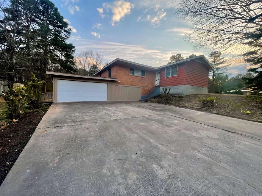 Perfect place to enjoy the peace and tranquility of the country lifestyle but just 10 minutes from downtown Little Rock. This 3 bedroom, 2 bath home features a large .46 acre lot just outside of city limits, a 2 car attached garage with a second overhead door to the backyard for ultimate accessibility, fully fenced backyard for children, pets, etc, a 10x12 detached shed for additional storage, or even a barn area for your mini farm! With 3 bedrooms, 2 full baths and 1400 square feet of living space, this home has plenty of room to spread out. There is an additional bonus room downstairs that would make a great office, craft area, or additional storage. Enjoy an on demand water heater, newer HVAC and roof, and several updates throughout this home! You'll find a seperate dining room off the kitchen, as well as a quaint sitting area just off the main living room that's perfect for a play room, or just a relaxing space to read a book. This home's location qualifies for a $0 down Rural Development loan so don't miss your opportunity to take advantage of the endless possibilities this home has to offer!!