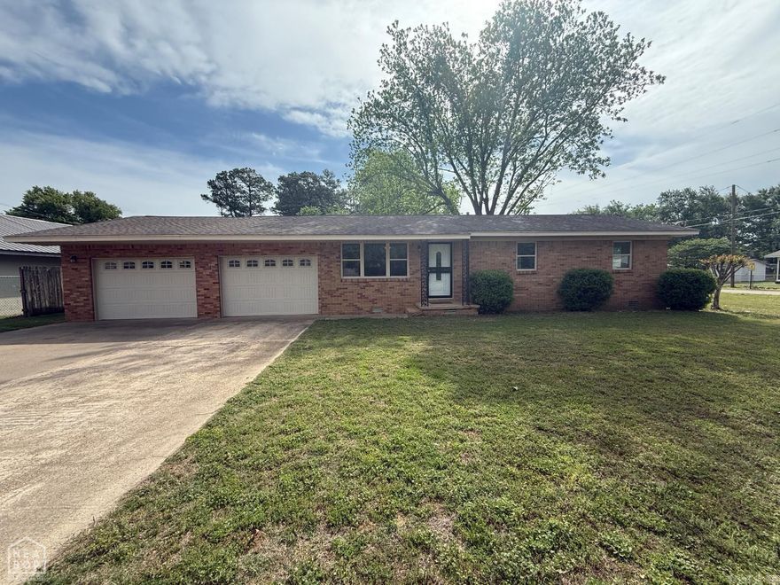 Fully refreshed and ready for its next owner! This 3BR/2BA home offers 1,161 sq ft plus a 192 sq ft sunroom for added flexibility. Upgrades include all new flooring (carpet, LVP, tile), fresh paint, new windows, interior doors, trim, and baseboards. Kitchen features stainless appliances, and the main bath boasts a newly tiled tub surround. Two-car garage and modern updates throughout make this home a must-see!