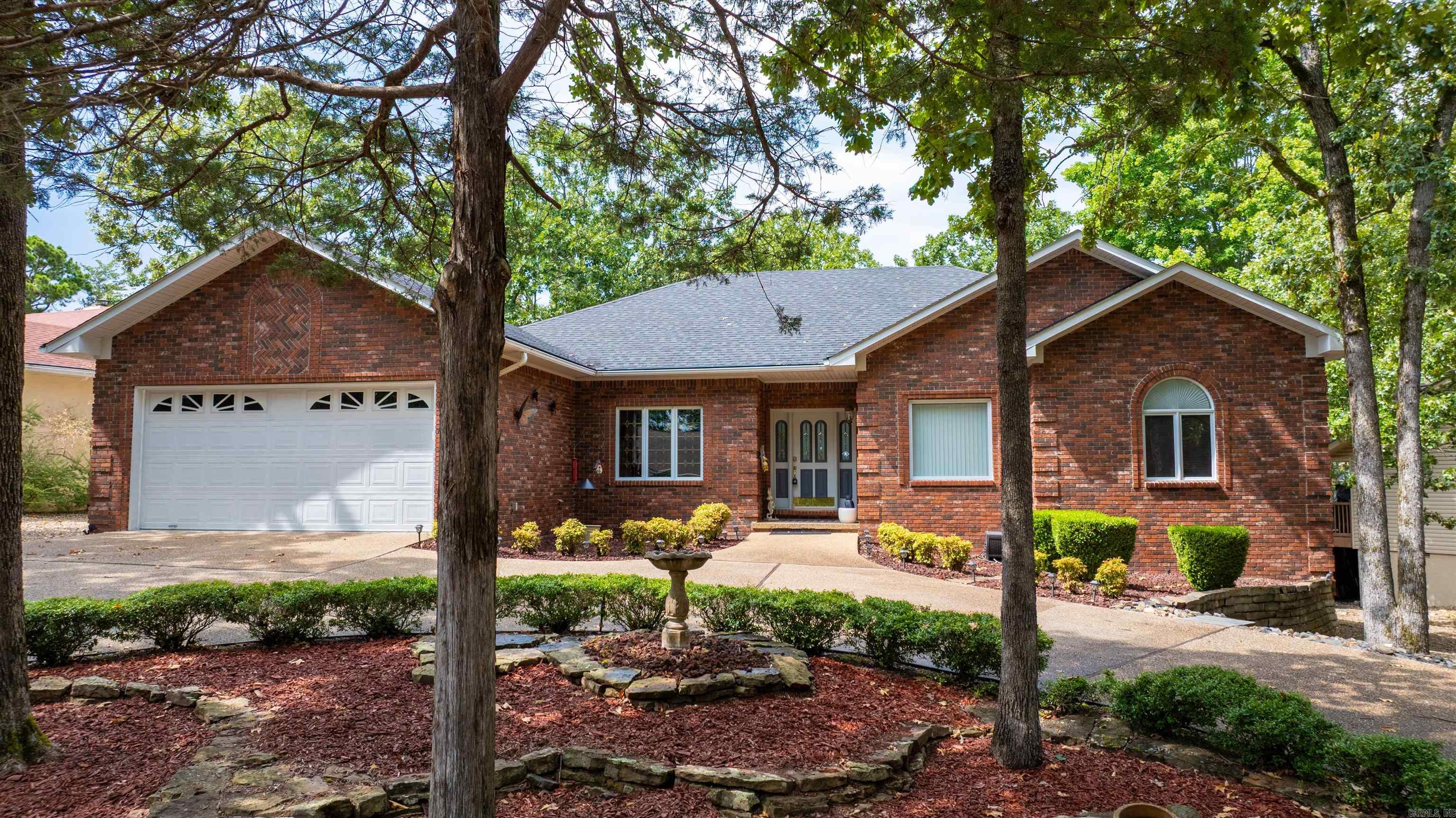 Great location on Lake Balboa! Located on the open body of water this affordable 3 bedroom, 2 1/2 bath home has been meticulously cared for! Great half circle driveway greets your guests with an open great room/ dining room overlooking the lake to entertain. Breakfast room and an office add to the primary suite on the main level and a heated/ cooled man cave/workshop in addition to the bedrooms 2 & 3 on the bottom floor. Primary suite features a sitting area and huge bath has large closets and all closet doors feature door opening lights! An elevated deck and a patio overlook the almost maintenance free yard and the lake! Covered boat dock has a boat lift/ sprinkler for lawn uses lake water/ downstairs closet is cedar lined/ additional large hall closet downstairs/ HVACS are 3 & 5 yrs old/ man cave/workshop has double outside doors/ Tree shade lot! Super clean home, great location and views!