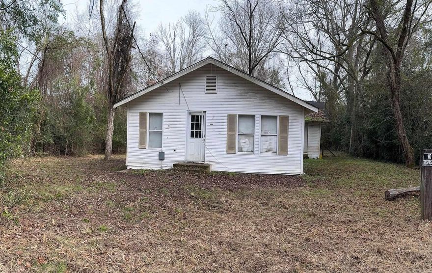 Small fixer-upper in need of repairs.  Insulated steel doors already in place.  Great opportunity for an investor or handyman.