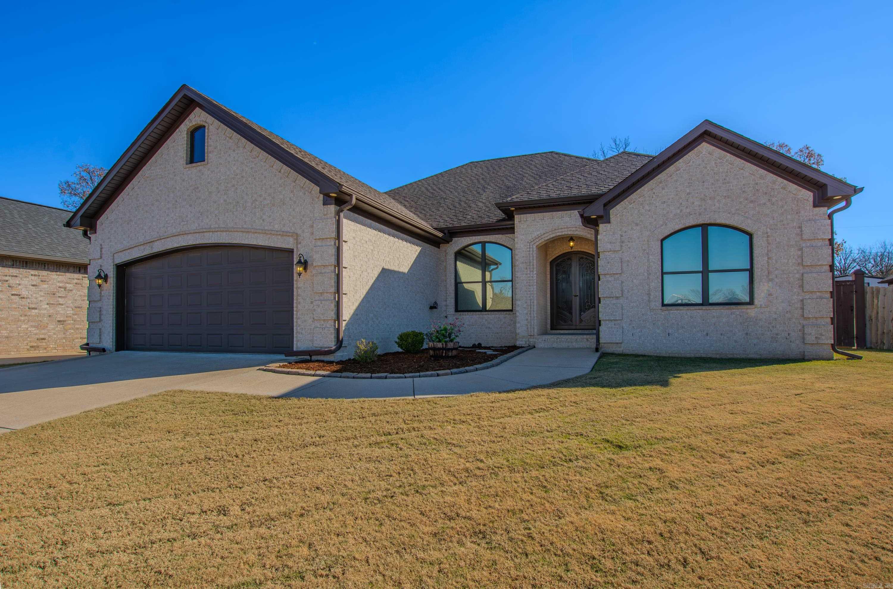 Welcome to 804 Sussix Loop! Tucked away in a perfectly sized subdivision close to town, amenities, restaurants, shopping, and LRAFB. This stunning home draws you in to a striking entrance with double iron front doors, making a lasting first impression. Inside, youāll find a beautifully designed interior with an open floor plan, high ceilings, and spacious rooms. The gorgeous granite countertops throughout add a touch of luxury to the heart of the home. The kitchen boasts modern appliances, plenty of counter space, and a cozy breakfast nook. Enjoy the comfort of an oversized primary suite and primary bathroom that features a beautiful tiled shower and separate jetted tub. Spacious primary closet is right off the laundry room. The meticulously maintained yard offers a serene outdoor space perfect for relaxation or entertaining. Fully privacy fenced with a partial outdoor covered patio space. The 2 car garage is spotless and can hold your full size vehicles. Please see Agent Remarks.